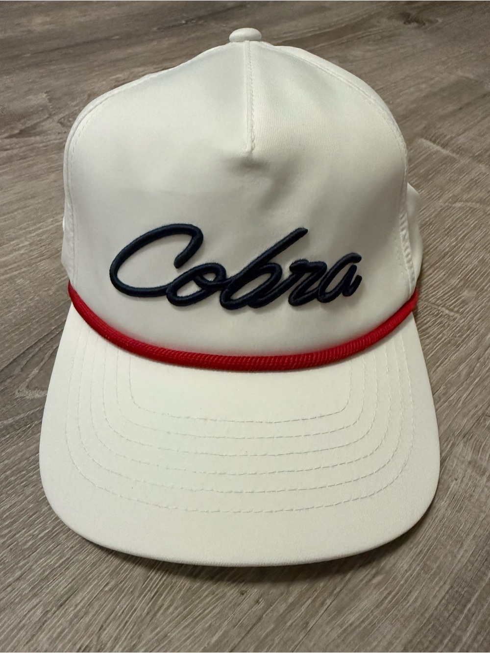 Men’s White Cobra golf rope hat with Red Trim